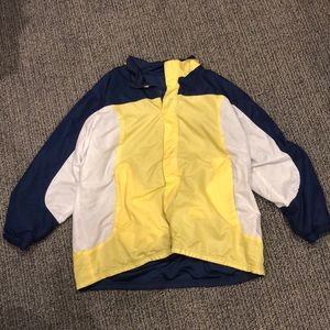 Blue, Yellow, and White reversible jacket.